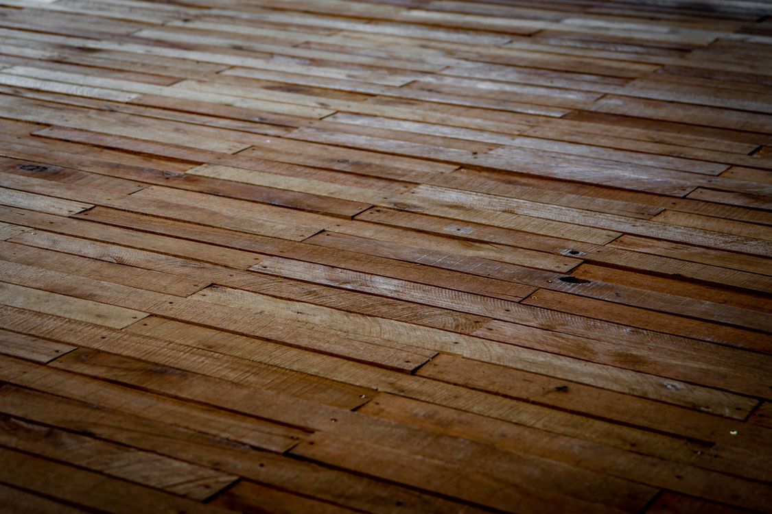 Hardwood Floor Refinishing Cost: Screen & Recoat vs. Full Sand in 2026
