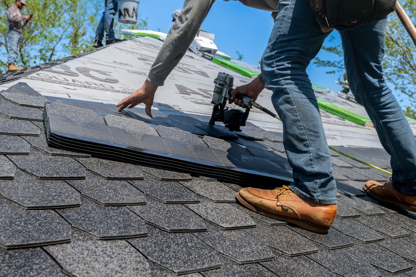 Roof Replacement Cost Per Square: Asphalt Shingle vs. Metal (2026)